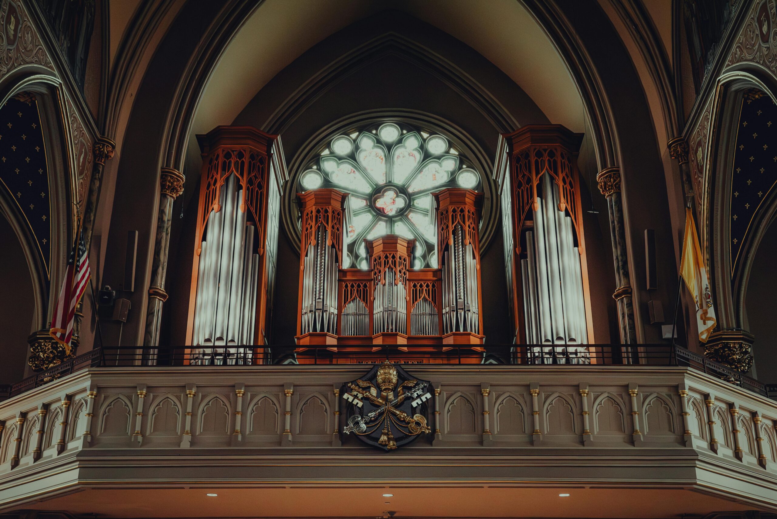 View from below of the great organ and Great Rose Window in the Cathedral Basilica of St. John the Baptist