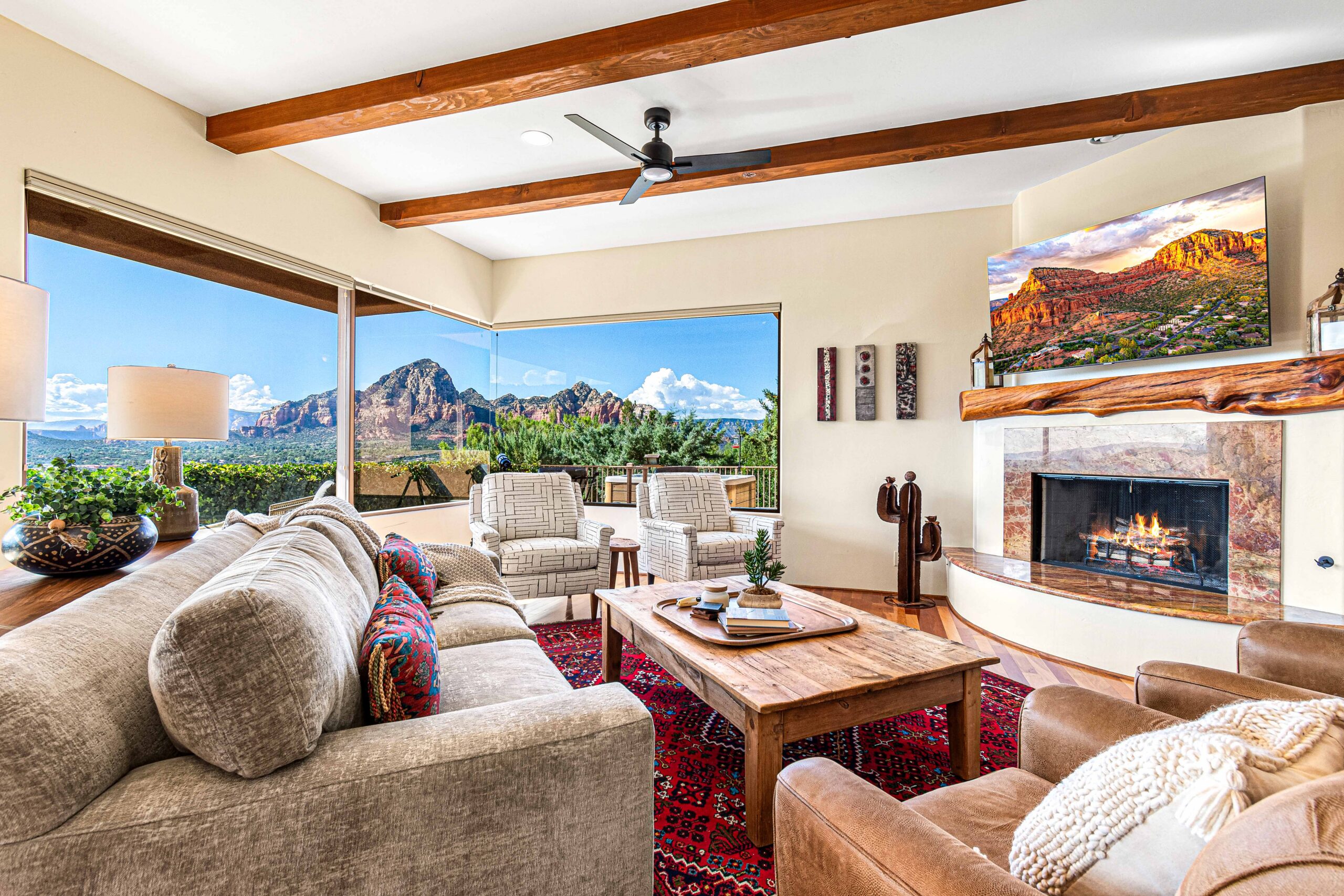 Red rock views from inside the living room of a Sedona vacation rental