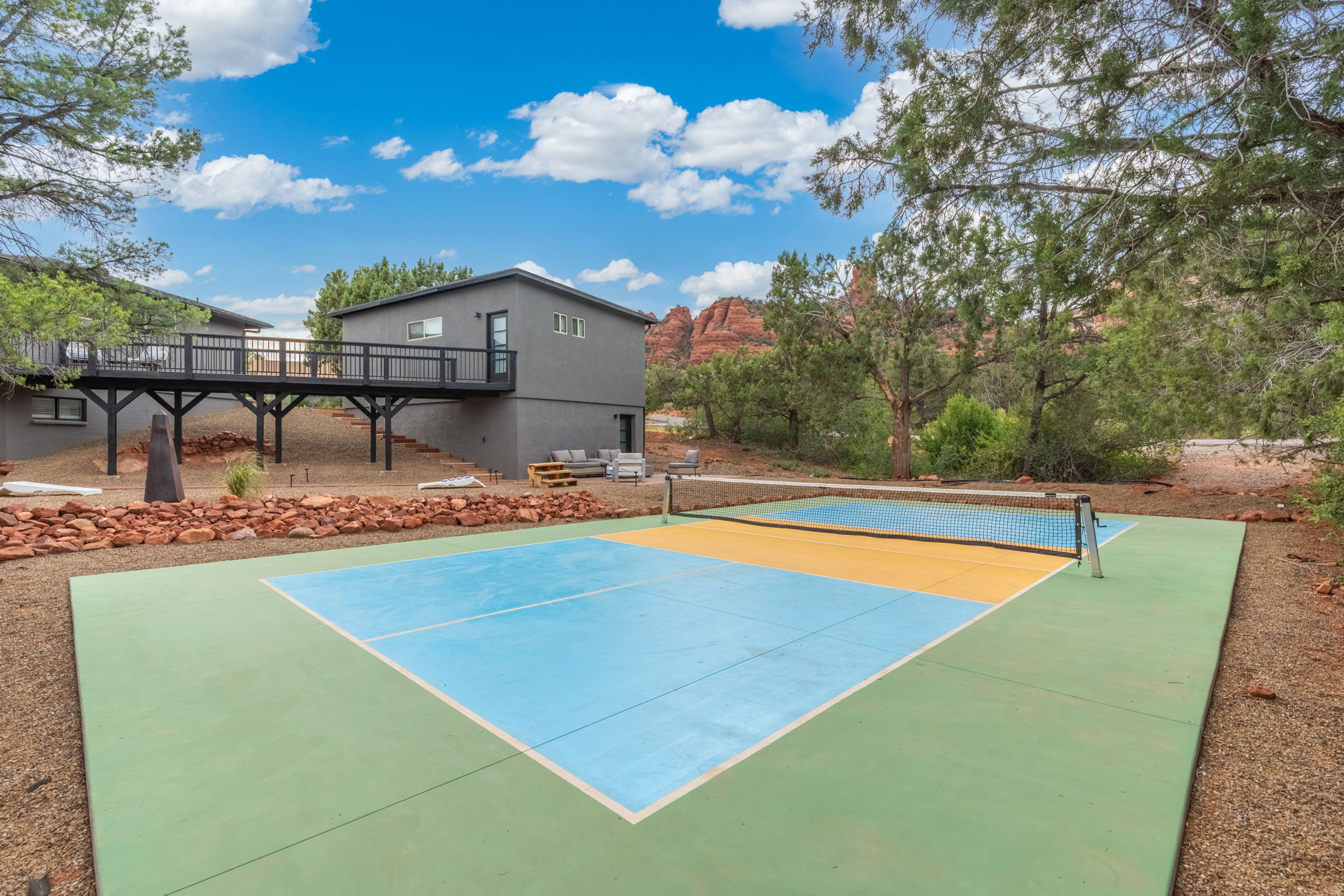 Pickleball court of a Sedona vacation rental with red rock views.
