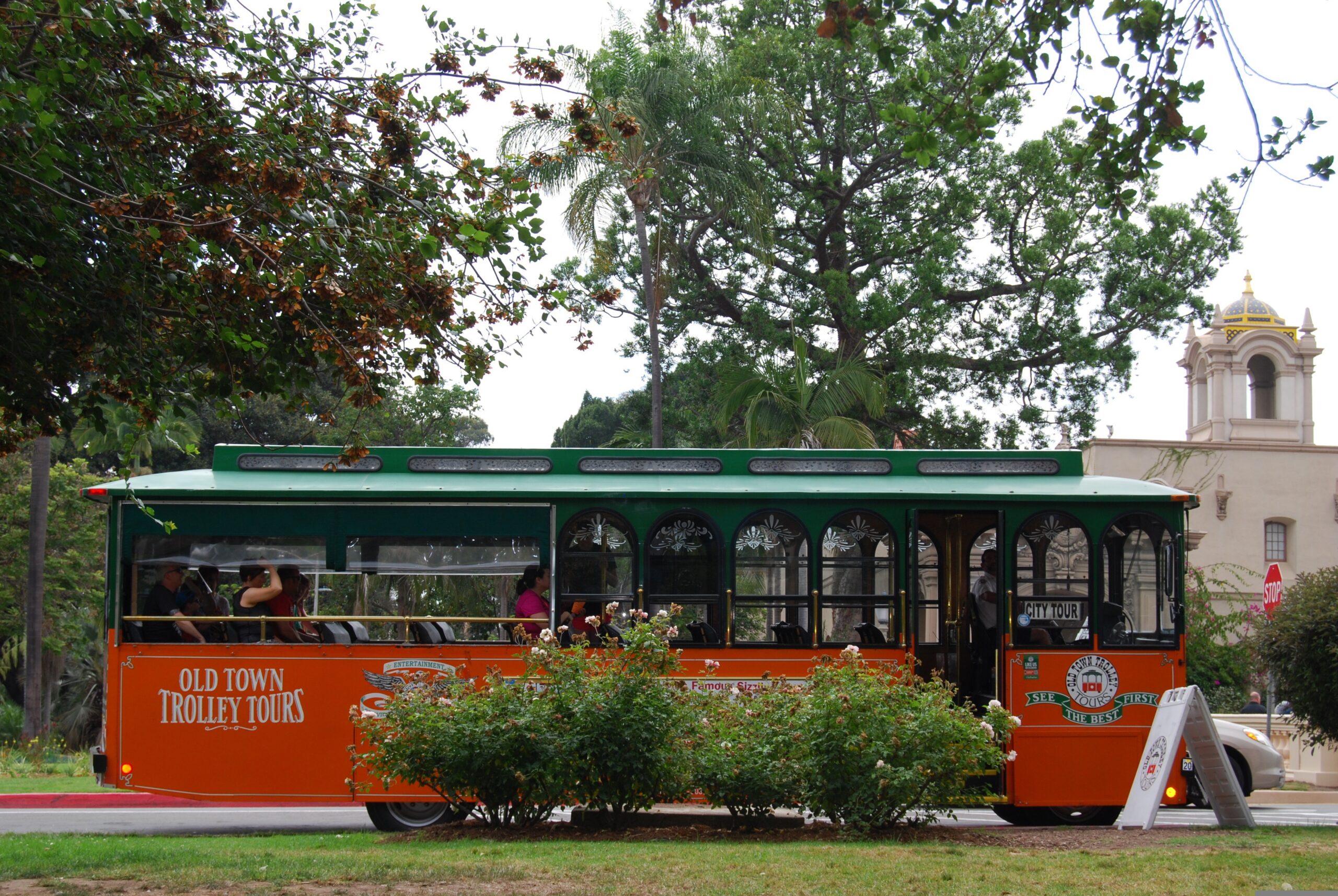 Trolley tour going around Savannah GA's historic district.