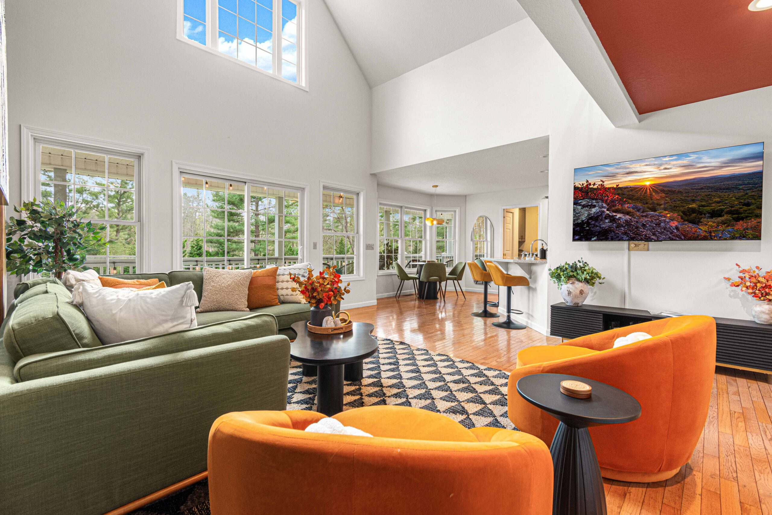 Luxury Asheville Home Living Room with TV and Plush Sofas