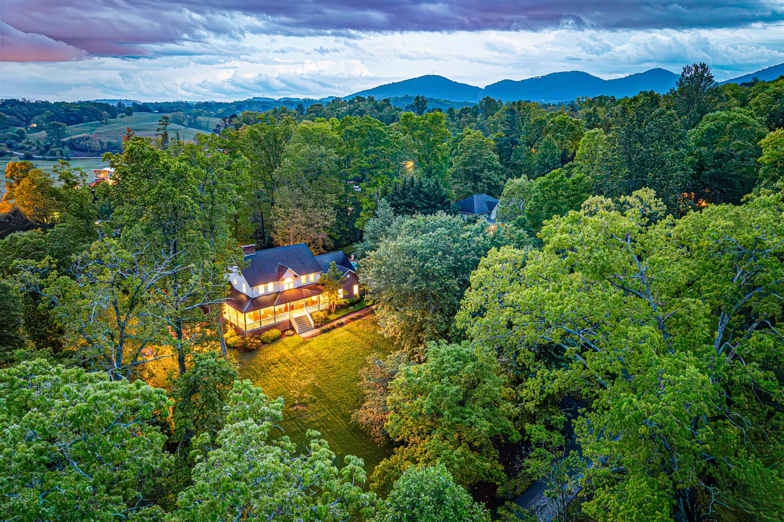 Aerial view of a secluded Asheville vacation rental surrounded by trees