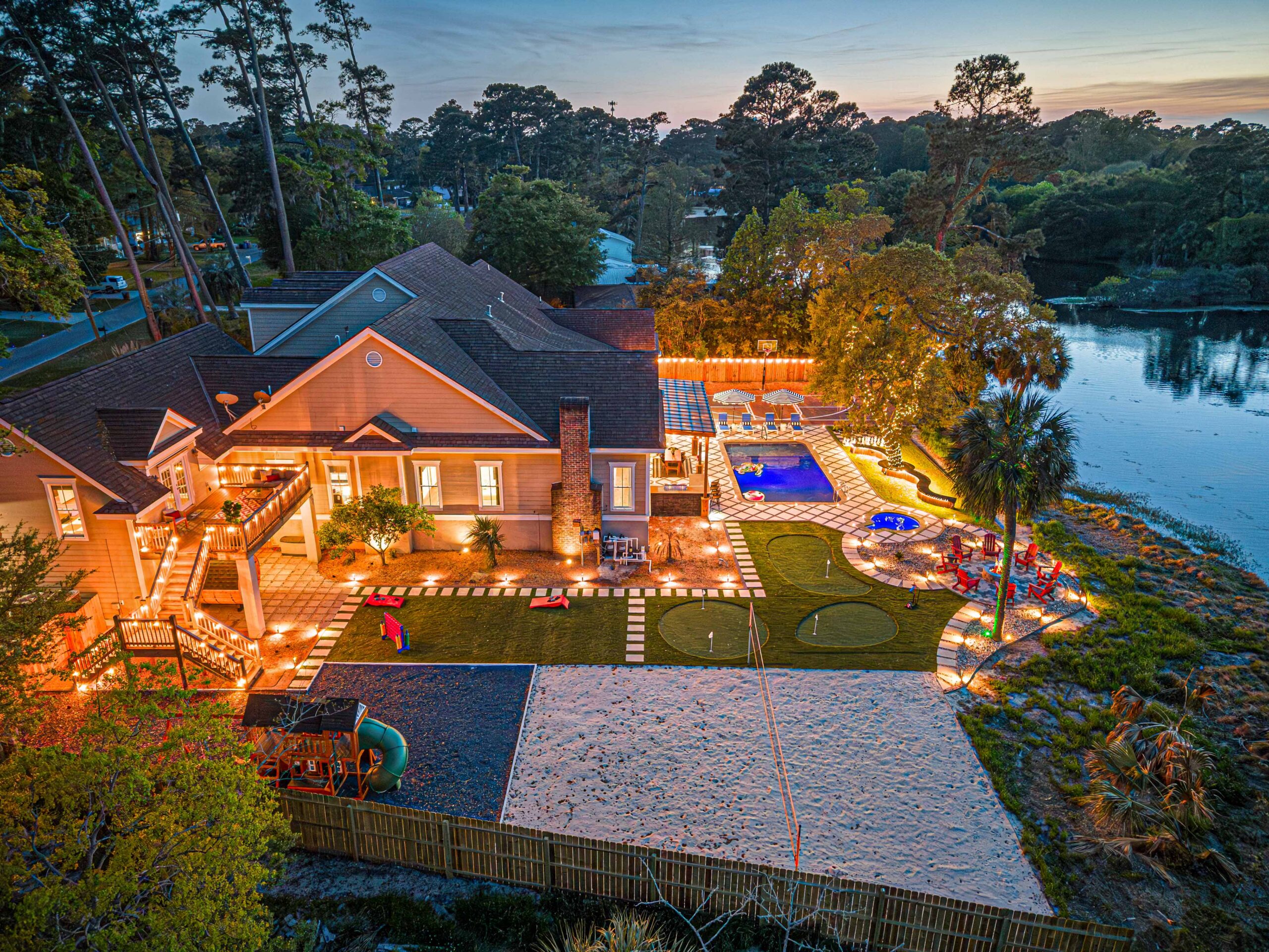 Lakefront Savannah Vacation Rental with pool and plenty of backyard amenities